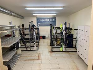 a room with a bunch of skis in a room at BOROVETS Royal Plaza - A409 in Borovets