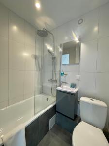 Ванная комната в Marijampole Apartment