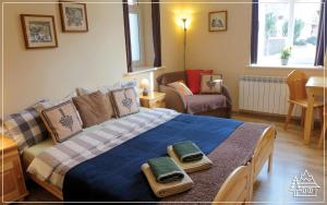 Posteľ alebo postele v izbe v ubytovaní Przystanek Rabka - Apartamenty w centrum