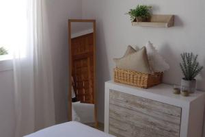 Łóżko lub łóżka w pokoju w obiekcie Apartamento completo max. 6 huéspedes