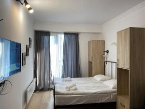 Letto o letti in una camera di Gudauri Hotel Loft, Apartment 418, Next to the Pirveli Lift