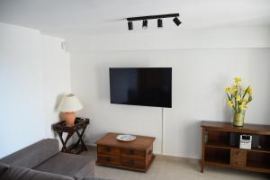 โทรทัศน์และ/หรือระบบความบันเทิงของ Apartamento Terraza Mar