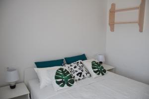 En eller flere senge i et værelse på Apartamento Terraza Mar