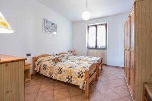 A bed or beds in a room at casa chiara
