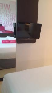 TV a/nebo společenská místnost v ubytování favehotel Pluit Junction