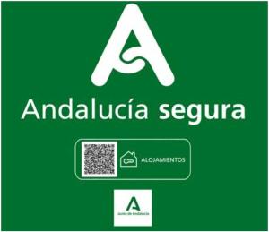 una señal verde con las palabras andoglula segovia en TODOSIERRANEVADA ZONA BAJA - EDIFICIO ATLAS - VISTAS A LA MONTANA - Junto a los Telecabinas en Sierra Nevada