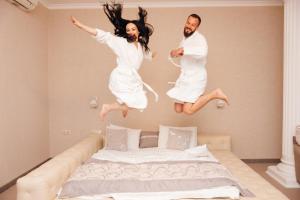 Cama o camas de una habitación en Grand Wellness Novahovo Hotel & Spa