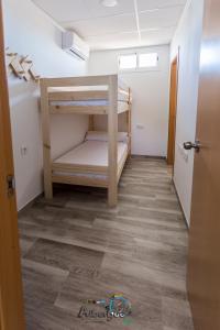 Postel nebo postele na pokoji v ubytování Albergue Multiaventura Active Andalucia