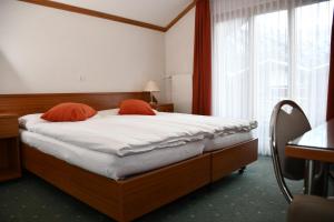 Postel nebo postele na pokoji v ubytování Hotel Elite