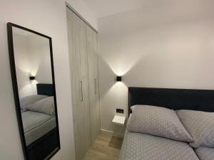 Posteľ alebo postele v izbe v ubytovaní Apartament Lenka