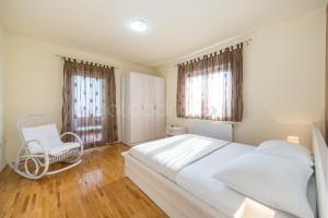 Posteľ alebo postele v izbe v ubytovaní City Central Apartments Dolore