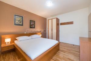 Postel nebo postele na pokoji v ubytování City Central Apartments Dolore