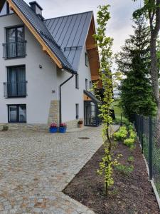 Vonkajšia záhrada v ubytovaní Pokoje na Buńdówkach