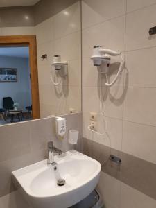 Kúpeľňa v ubytovaní Pokoje na Buńdówkach