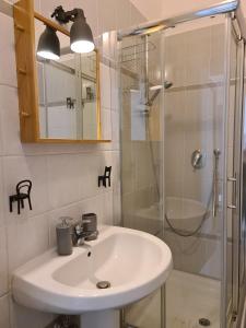 Kúpeľňa v ubytovaní Vanzi Rooms