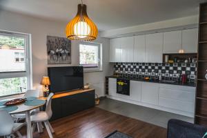 Kuchyňa alebo kuchynka v ubytovaní Apartament Baltica Towers