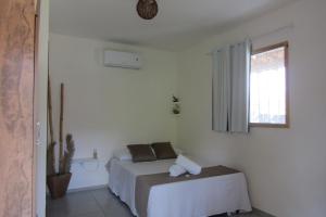 Ένα ή περισσότερα κρεβάτια σε δωμάτιο στο Pousada Lemos +16 φωτογραφίες