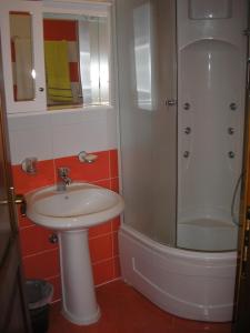 a bathroom with a sink and a shower at 500 Meters from Grate Beach, App 1 in Ulcinj +17 photos