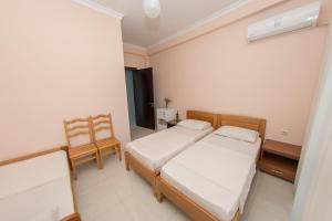 Voodi või voodid majutusasutuse Guesthouse Gio toas