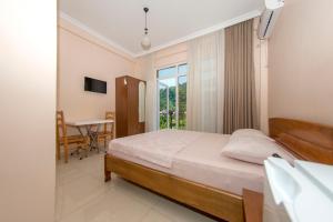 Voodi või voodid majutusasutuse Guesthouse Gio toas
