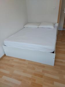 Postel nebo postele na pokoji v ubytování Chez sylvie + 4 fotografie