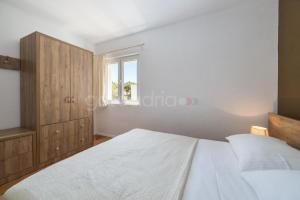Postel nebo postele na pokoji v ubytování City Central Apartments Dolore
