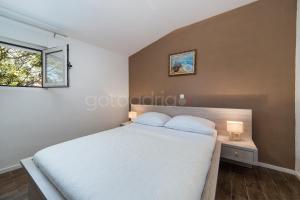 Postel nebo postele na pokoji v ubytování City Central Apartments Dolore