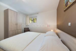 Postel nebo postele na pokoji v ubytování City Central Apartments Dolore