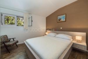 Postel nebo postele na pokoji v ubytování City Central Apartments Dolore