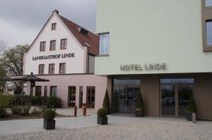 a building with a hotel in front of it at Hotel Linde in Günzburg