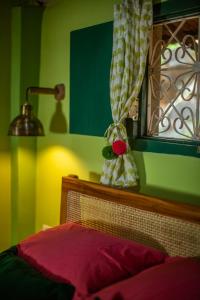 A bed or beds in a room at Casa Jaali