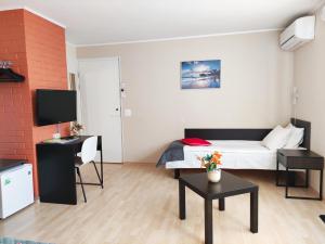 TV a/nebo společenská místnost v ubytování Aisa Guesthouse
