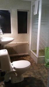 A bathroom at Appartement De Nachtwacht