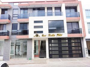 a building with a sign that reads new healthy cities at Casa Bertha Hotel y Servicios SAS in Nobsa