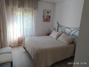 Postel nebo postele na pokoji v ubytování Apartamento Dacosta