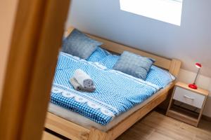 Uma cama ou camas num quarto em Frajárka