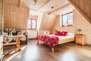 Posteľ alebo postele v izbe v ubytovaní Pokoje Gościnne Stara Strzecha