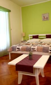 Postel nebo postele na pokoji v ubytování IstraNova Apartments