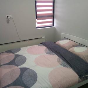 Rúm í herbergi á Apartman Riboškić Divčibare 2