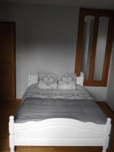 Postel nebo postele na pokoji v ubytování Maison LOUVRE LENS 2 Chambres
