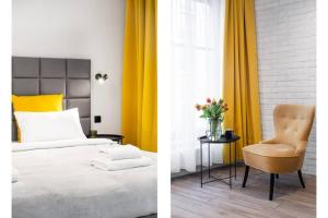 Posteľ alebo postele v izbe v ubytovaní HOUSEHOST Apartment: Miodowa 42/8b street