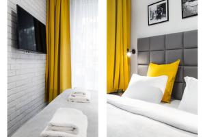 Posteľ alebo postele v izbe v ubytovaní HOUSEHOST Apartment: Miodowa 42/8a Street