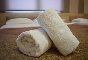 Postel nebo postele na pokoji v ubytování Filippion Hotel
