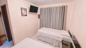 Cama o camas de una habitación en Nacional Park Hotel Lages