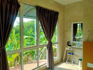 Zahrada ubytování Rick Resort Teluk Intan