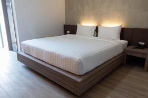 โรงแรมดับเบิ้ลดี ปากเกร็ด Double D hotel客房内的一张或多张床位