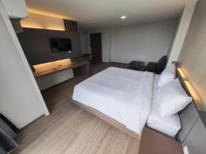 โรงแรมดับเบิ้ลดี ปากเกร็ด Double D hotel客房内的一张或多张床位