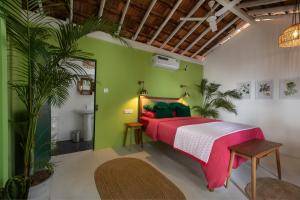 A bed or beds in a room at Casa Jaali