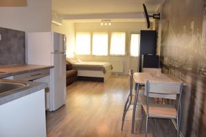 Postel nebo postele na pokoji v ubytování La Siesta Bogács Apartman