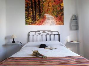 Ένα ή περισσότερα κρεβάτια σε δωμάτιο στο Apartamento Turístico La Ribera